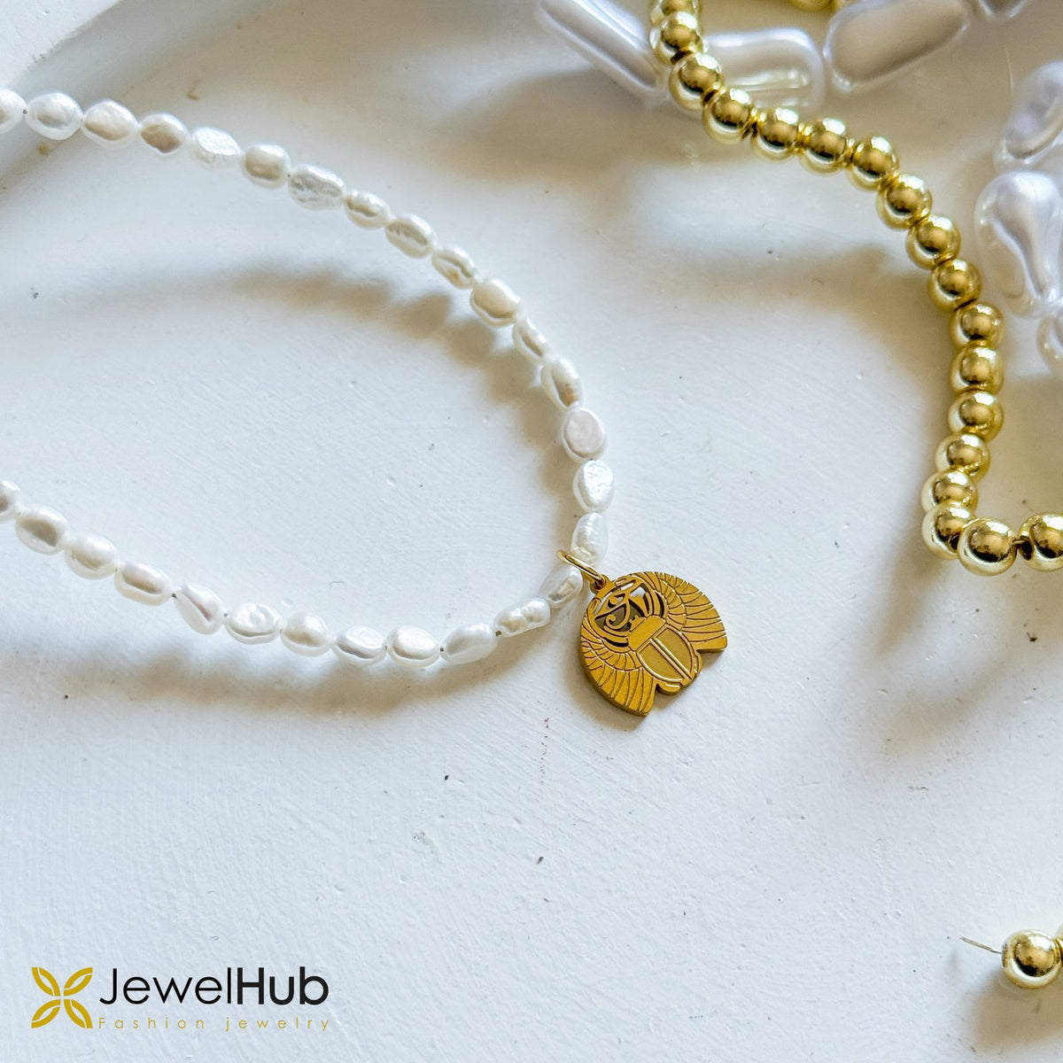 لآلئ المياه العذبة مع قلادة فرعونية